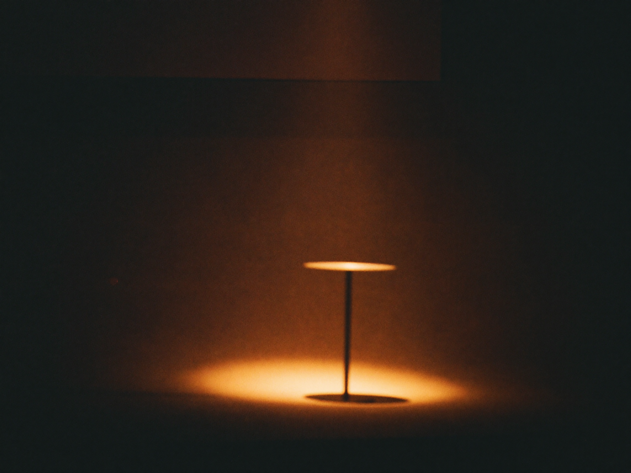 Stage and warm spotlight from a recent talk